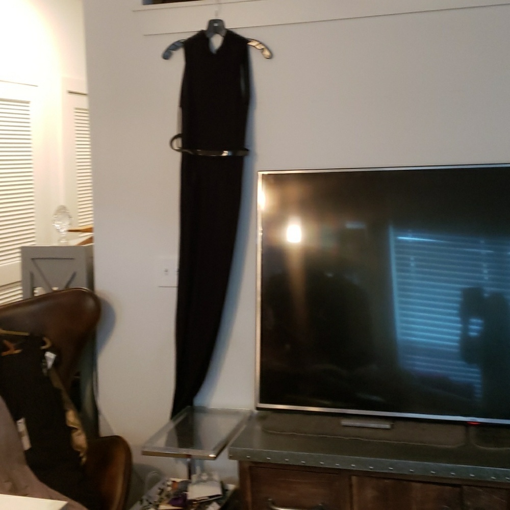 Black jumper. Size 8. By Theia couture